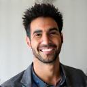 Headshot of Alex Rivera, a tech blogger.